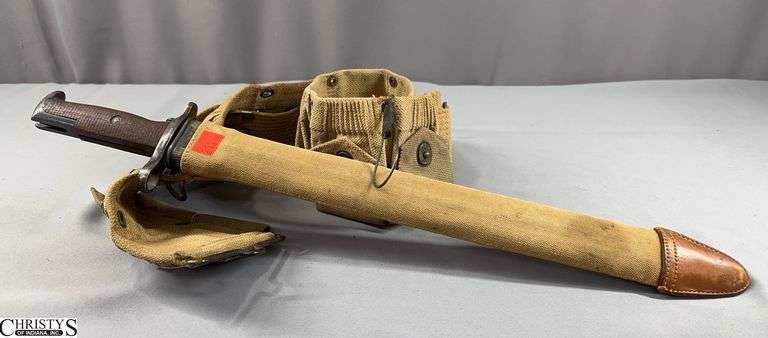 Ammo Belt with Bayonet and Scabbard.  Ammo Belt is Canvas with Eyelets For Attaching Other Equipment.  Bayonet is Marked US,  S A  1908 #333784 and is Approx. 20 1/4" Total Length image