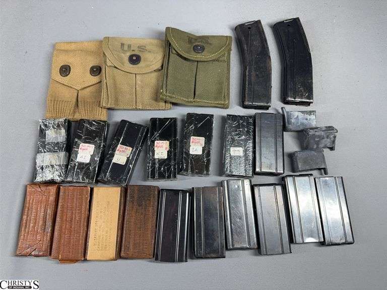 Approx. 19 .30 Carbine Magazines and 3 Pouches image