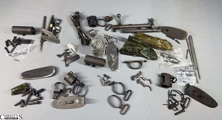 Misc. Gun Parts Including M1903 Springfield Triggers, Front Sight for Remington M1903, Bolts and More. image