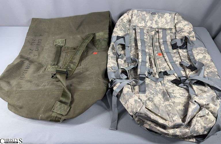 2 Large Duffle Bags- 1 Green Army Duffle and a Military Style Duffle Bag with the Universal Camouflage Pattern image