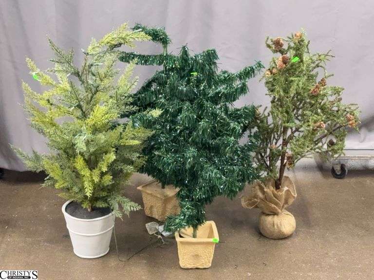 4 Small Artificial Christmas Trees - 38" of tallest image