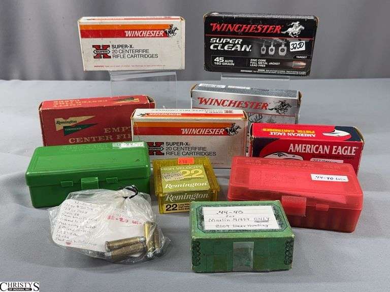 Misc. Ammunition.  Misc. Calibers.  Includes a Box of Approx. 50 cal. 22 Cartridges, Full Box of 50 cal. 45 Auto, Box of 50 Aguila 9mm (reloads), Brown Plastic Container with 18 9mm and 3 Baggies of 9mm, Box of 17 cal. 30-06 with Some Brass Pieces, Box of 20 cal. 358 Cartridges, Box of 4 cal. 358 Cartridge and Some Brass, Box of 20 cal. 30 Cartridges, Green Plastic Box of 46 cal. .44 Mag., Red Plastic Box with 9 cal. .44-40 Win Cartridges and Brass, 15 cal. .44-40 Cartridges,, Box of 10 cal. .357 Mag. and Brass Pieces and a Baggie with 10 cal. .32-20 Cartridges.  Some of this Ammunition May Be Reloads image