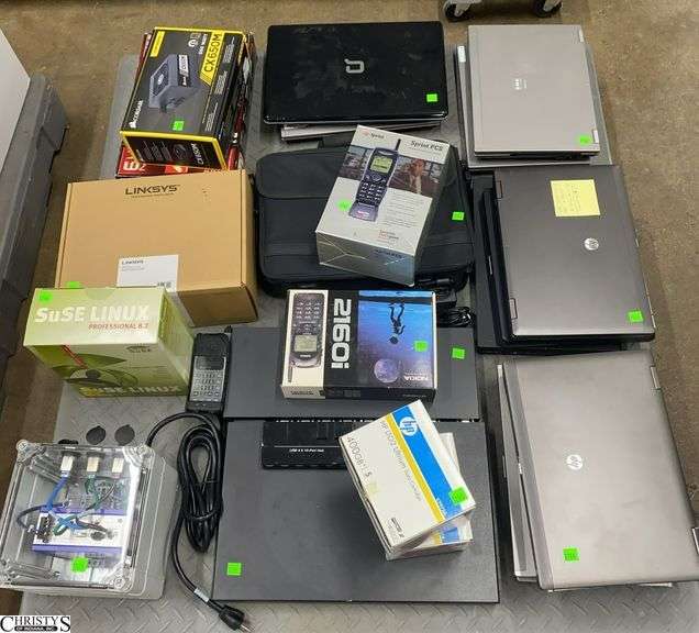 Skid of Laptops, Cell Phones, Power Supplies, Belden Firewall, Misc - HP, Lenovo, and Others - SKID NOT INCLUDED image