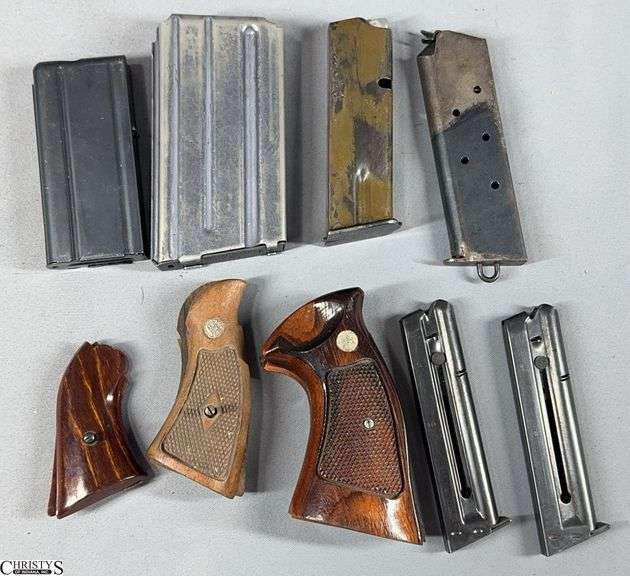 3 Sets of Wood Grips (Ruger Bearcat, S&W Target & S&W) and 6 Various Magazines ( 2 S&W Model 41 Mags, 1 Mag Marked cal. 5.56mm image