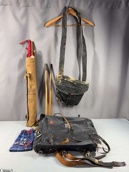 U.S. Army Flag Kit, Lead Projectiles (Minie Balls), What Looks Like a Civil War Tarred Canvas Haversack, Black Tarred Canvas Knapsack and Cleaning Rods image