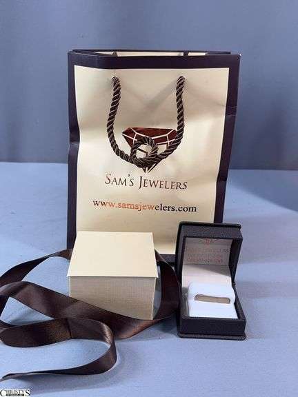 Empty Brown Leather Jewelry Box Marked Sam's Jewelers in a Beige/Brown Unmarked Box in a Beige/Brown Sam's Jewelers Bag.  Inside the brown jewelry box is an empty tray with markings 10K 1.00ct. $4000. image
