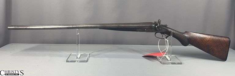 Colt M1878 Double Barrel Shotgun 12 ga. SN: 11789.  This firearm includes a letter dated January 28, 1958 that states "Upon checking our old gun records, we find that  your shot-gun was manufactured and shipped from our factory in 1882." image