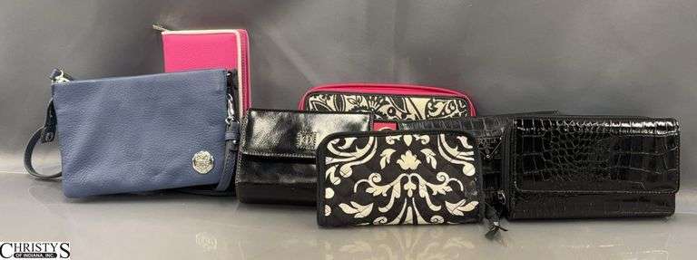 7 Ladies Wallets and Wristlets/Crossbody - 8" x 5" of largest image