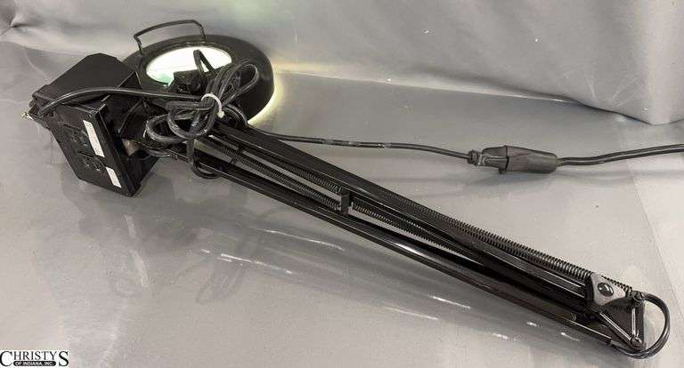 Clamp On Magnifying Light With Power Outlet image
