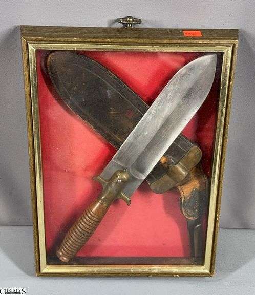 Knife Marked US Springfield 4653.  Blade Approx. 8 1/2" Long.  This knife is in a shadow box.  It is said to be from the 49th Iowa Volunteer Infantry  Roll - Frank M. Vertz - Company H 49th Iowa Volunteer Infantry.  It is said that this knife went up San Juan Hill image