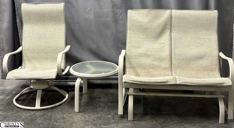 Patio Glider, Swivel Chair, and Glass Top Side Table - 45" x 41" x 17" seat of glider - shows wear, some damage to fabric image