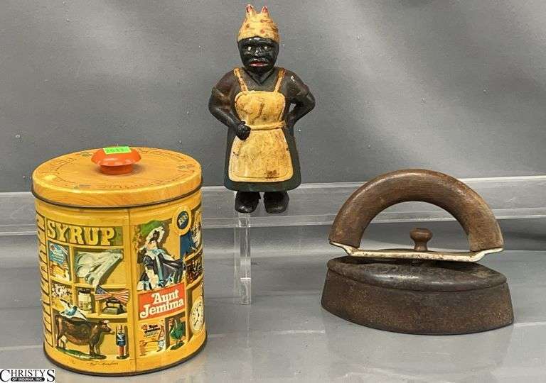 Americana Cast Iron Coin Bank 7", Sad Iron image