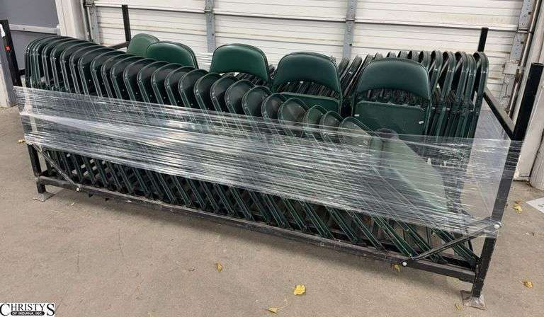 Rack With Green Vinyl Padded Folding Chairs Rack Does Not Have Wheels Approx 53 Chairs image