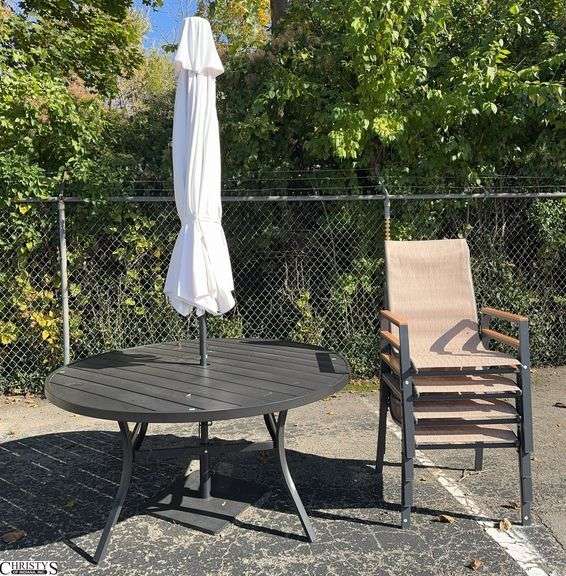 60” Round Patio Table, Umbrella with Stand, and 4 Chairs, One Chair is Grey and 3 Tan Arm Covers. image