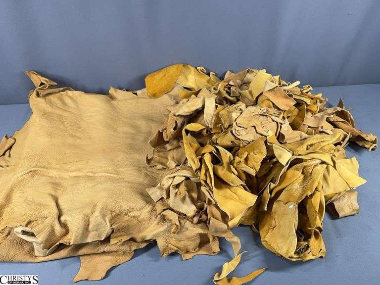 Leather- 1 Larger Scrap Piece and Small Scrap Pieces image