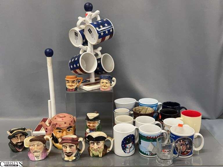 Toby Jug Style Creamers, Salt & Pepper, Teapot, Assorted Coffee Mugs, Paper Towel Holder - 14" of tallest image