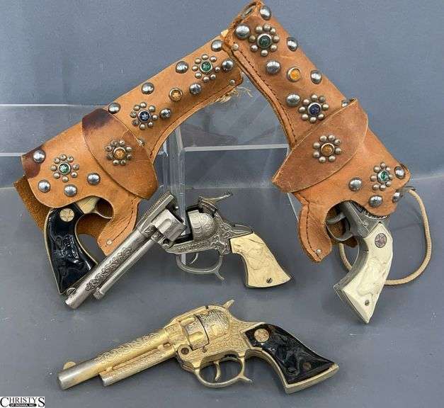 4 Toy Character Play Guns, 2 Have Decorated Holsters image