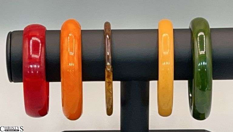 5 Bakelite Style Bangles, Red, Green, Orange, Brown and Butterscotch image