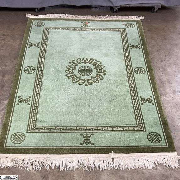 Green Accent Rug 55x79 Needs Cleaned image