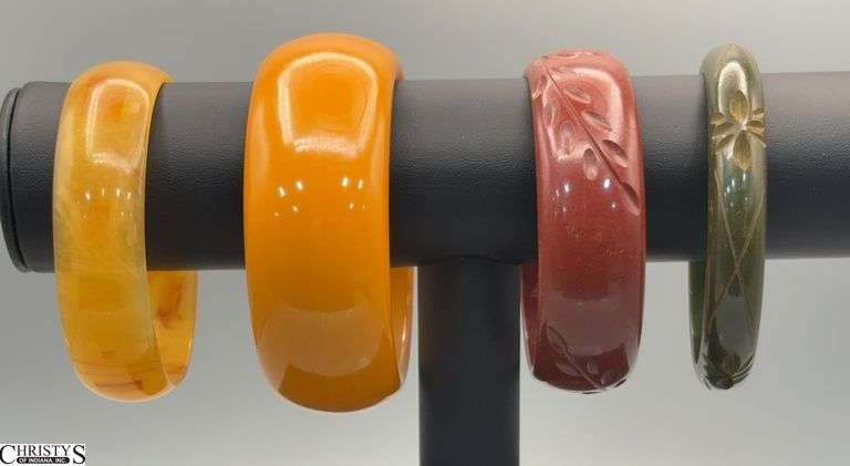 4 Bakelite Bangles, Green, Brown and Butterscotch Thickest just over 1", Diameter inside 2.5" image