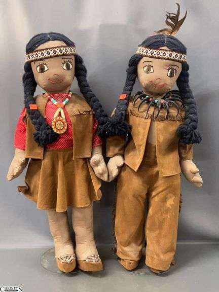 Two 28" Native American Style Dolls - Both show wear and would benefit from a cleaning image