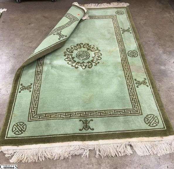 Green Accent Rug 55x79 Needs Cleaned image