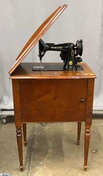 Singer Sewing Machine in Cabinet 22x16x31 Worn and Needs Cleaned image