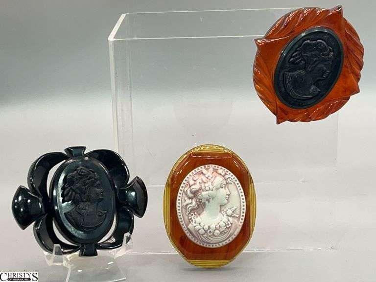 3 Vintage Bakelite and Celluloid Brooches, Tortoise, Black and Apple Juice Largest 3x2.25" image