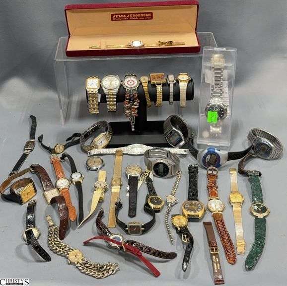 Watches, including Seiko, Jules Jurgensen, and Gucci with leather, metal bands, gold and silver-toned cases, and different dial styles. image