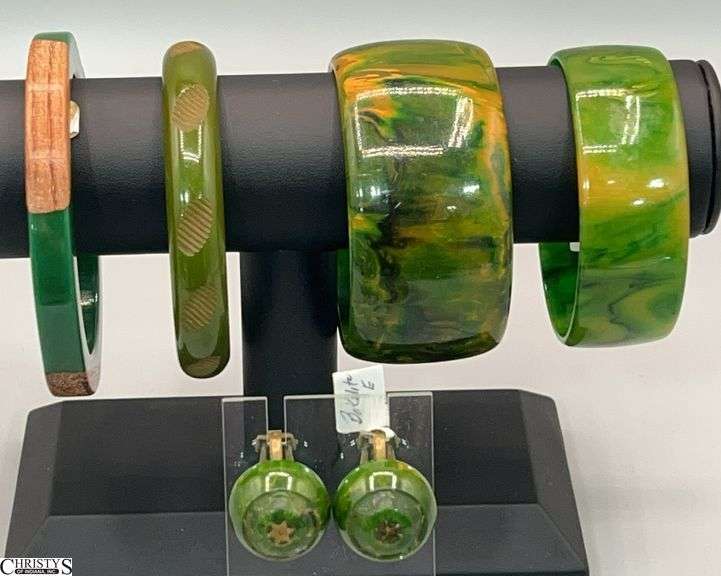 4 Bakelite Bangles and 2.75"Center 1.5" Wide and Earrings, Appear to Be Missing Accent image