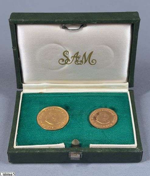 1977 South African 2-Coin Gold Proof Set in it's Original Green Presentation Box.  It includes a 1 Rand Coin and a 2 Rand Coin image