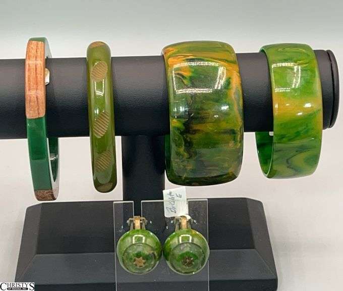 4 Bakelite Bangles and 2.75"Center 1.5" Wide and Earrings, Appear to Be Missing Accent image