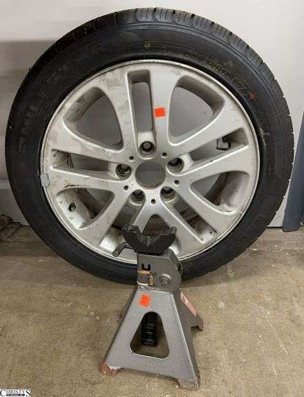 Tire and Jack Stand image