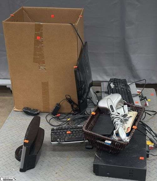 Skid of Misc Electronics, Bose Sound Dock, Keyboards, Monitor, Power Strips, Cords. Untested. SKID NOT INCLUDED. image