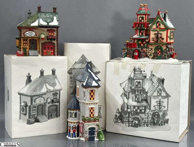 3 Department 56 Heritage Village North Pole Series Buildings, "Orly's Bell & Harness Supply" from 1991, "Tin Soldier Shop" from 1995, and "Glass Ornament Works" from 1997 image