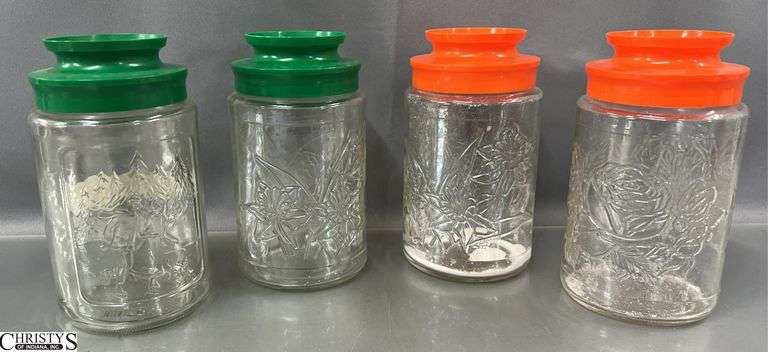 4 Vintage Glass Canisters - 7" of each image