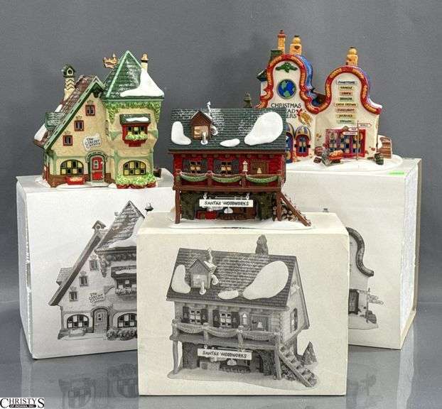3 Department 56 Heritage Village Collection & North Pole Series, 'Santa's Woodworks', 'The Glacier Gazette', and 'Christmas Bread Bakers' image