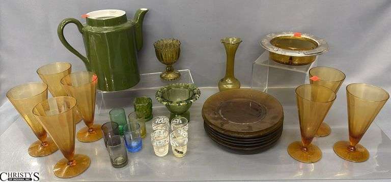 Amber Tone Glasses and P lates, Green Tone Glass Pcs, Green Ceramic Teapot - missing lid, Sherry Glasses - 9" of tallest image