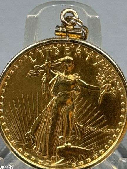 1/2 oz $25 Gold American Eagle Coin in 14K Bezel.