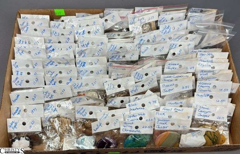 A Flat of Single Stone Pendants in Individual Packages.  Most Packages are labeled. image