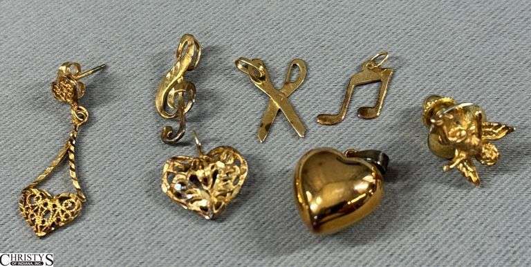 14K Yellow Gold Items Includes an Angel Pin, 2 Heart Pendants, 1 Music Note Pendant, 1 Earrings and 2 Charms (scissors & Musical Notes) image