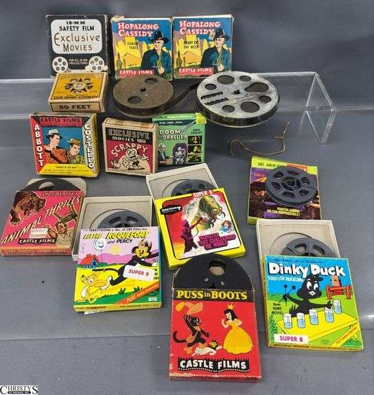 15 8mm Film Reels, Dinky Duck, Hopalong Cassidy, Doom of Dracula, and others 6 are empty boxes image