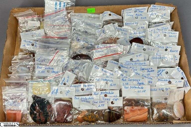 A Flat of Single Stone Pendants in Individual Packages.  Most Packages are labeled. image