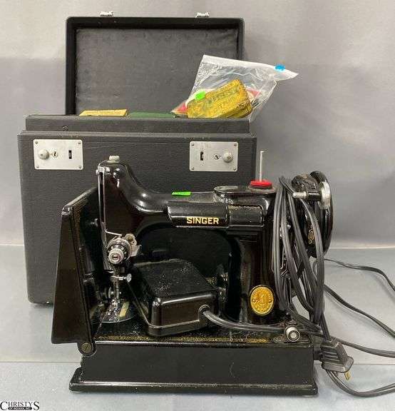 Singer Portable Electric Sewing Machine 221-1 with Case and accessories - 11" x 9" of machine image