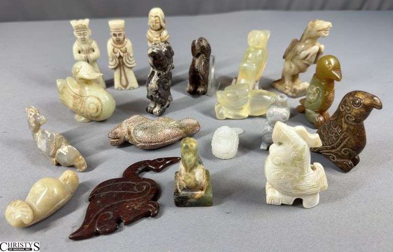 19 Small Carved Figures. image