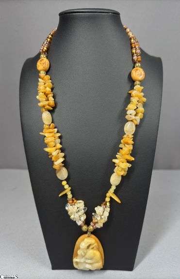 Unmarked Stone and Bead Necklace with an Stone Animal Pendant in a Honora Collection Box image