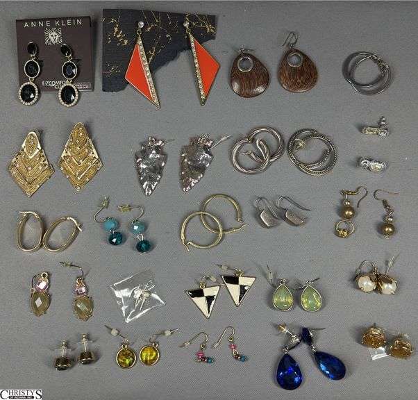 24 Pairs of Earrings and a Dish of Single Earrings image