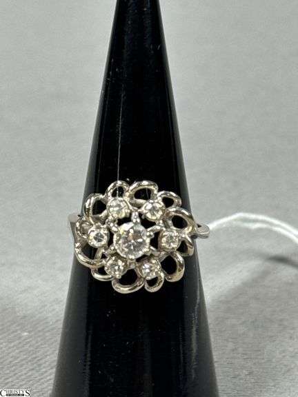 14K White Gold Ring with Center Diamond and 6 Surrounding Diamonds image