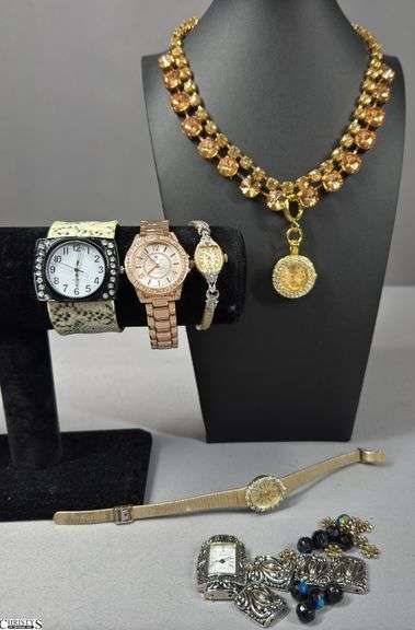 6 Watches / Time Pieces.  Includes a Bulova Wrist Watch, a Geneva Clock Necklace, and 4 Other Wrist Watches.  The Novelle Wrist Watch Band is in Pieces. image