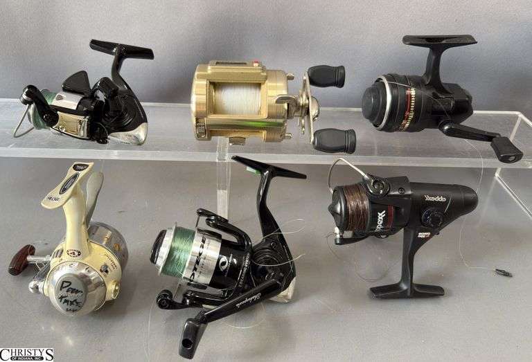 6 Fishing Reels, Cabelas, Abu Garcia, Shakespeare, and others image